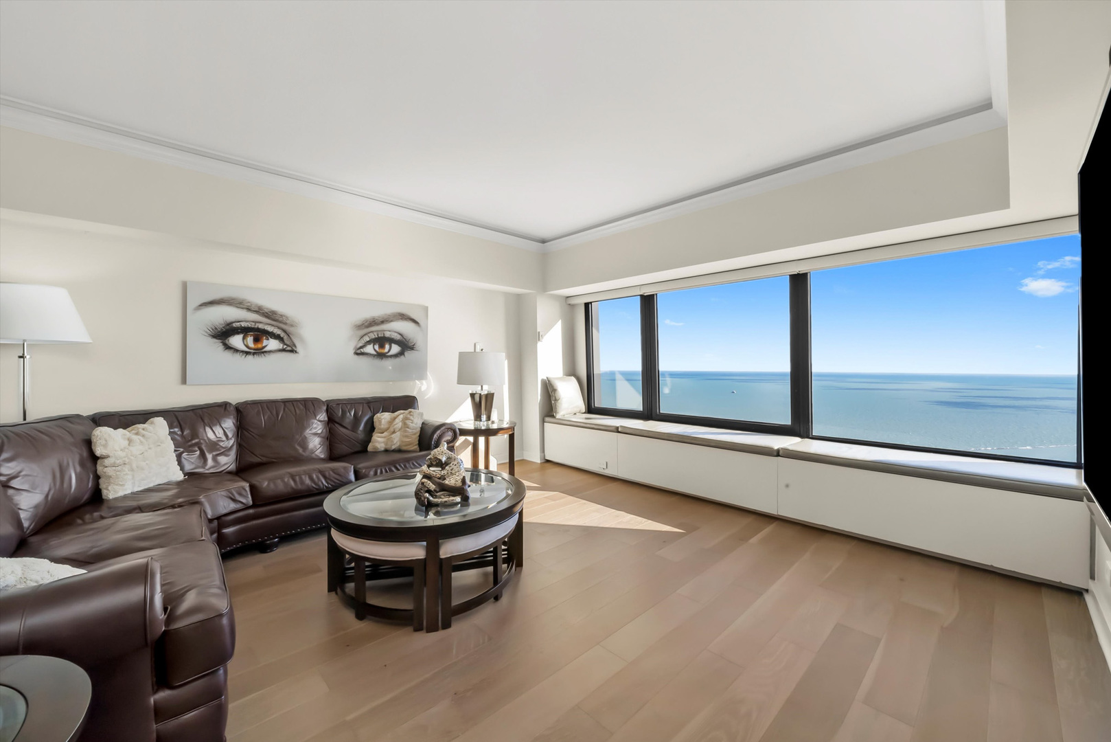 175 East Delaware Place, Unit 7107 Chicago, IL 60611 - Photo 11 of 42 a living room with furniture and a large window