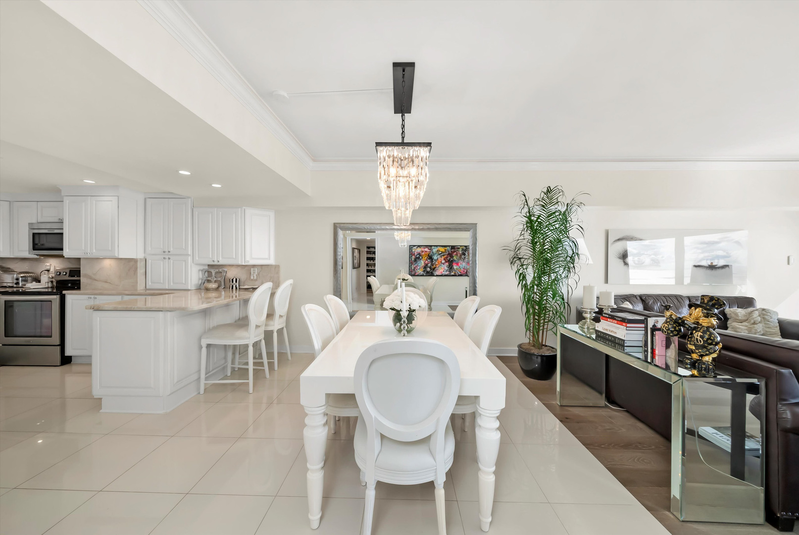 175 East Delaware Place, Unit 7107 Chicago, IL 60611 - Photo 16 of 42 a very nice looking dining room with a large window and stainless steel appliances
