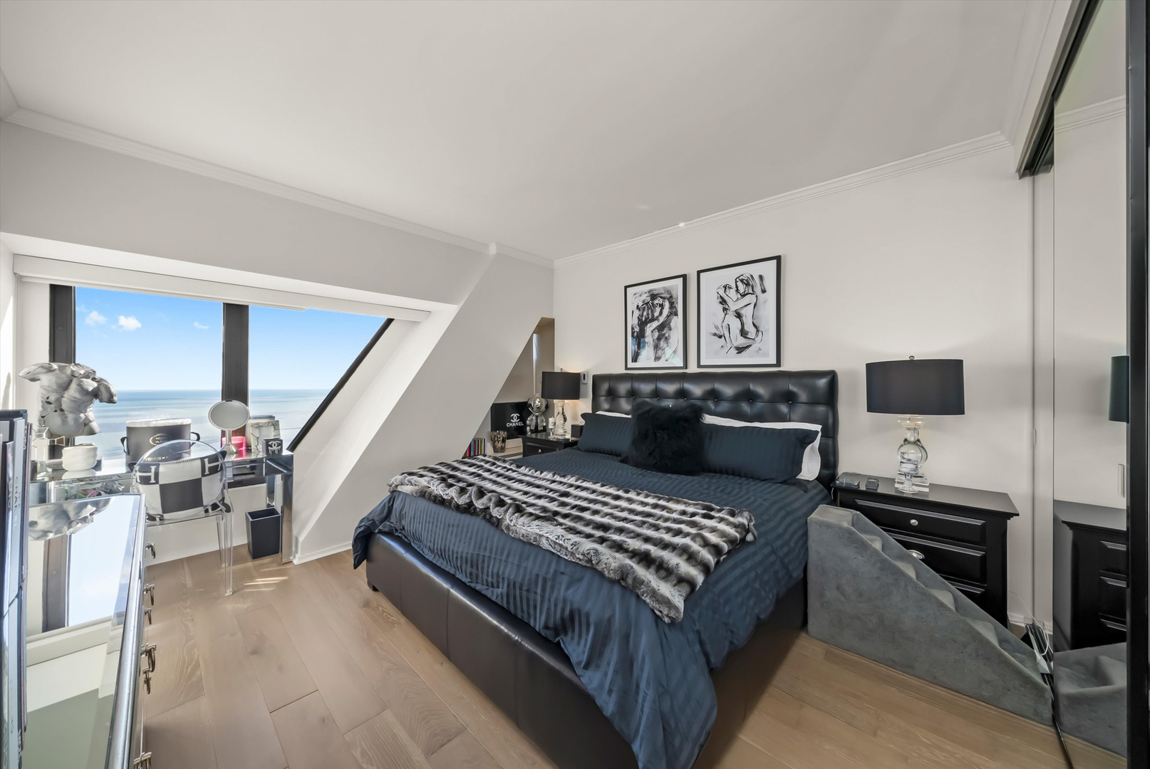 175 East Delaware Place, Unit 7107 Chicago, IL 60611 - Photo 17 of 42 a living room with furniture and a flat screen tv