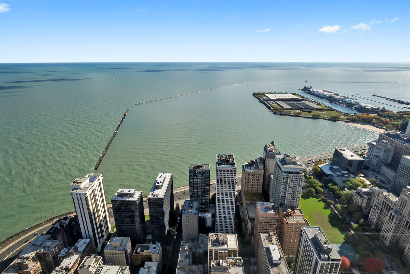 175 East Delaware Place, Unit 7107 Chicago, IL 60611 - Photo 27 of 42 a view of a chairs and table in a terrace