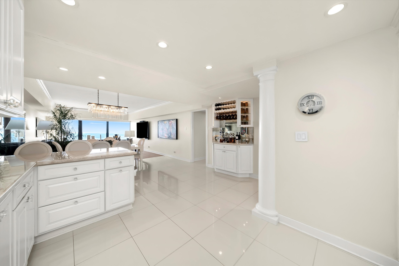 175 East Delaware Place, Unit 7107 Chicago, IL 60611 - Photo 7 of 42 a bathroom with a sink a toilet and mirror