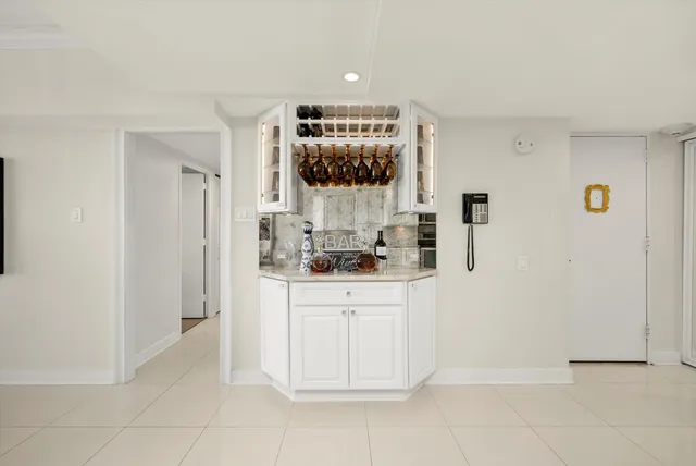 a bathroom with a sink and mirror