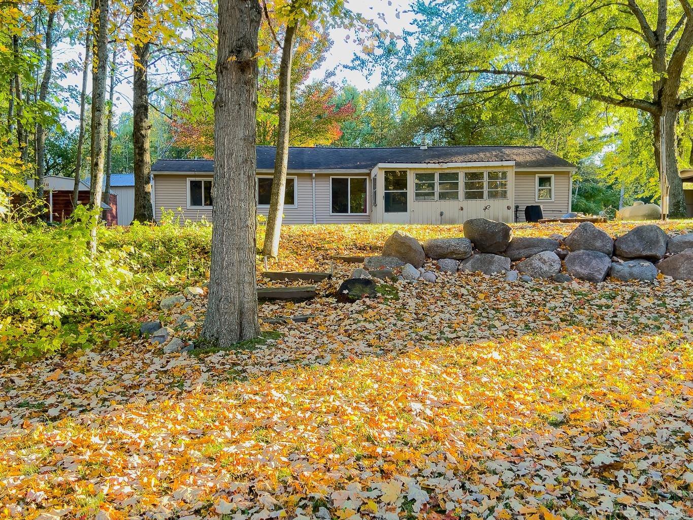 1123 Radov Road Gladwin, MI 48624 - Photo 1 of 29 Did you know... the front side of a house is the side facing the water?