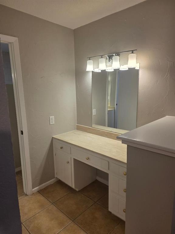 Undisclosed Address Hurst, TX 76054 - Photo 12 of 29 DRESSING AREA FROM MASTER BEDROOM TO BATH