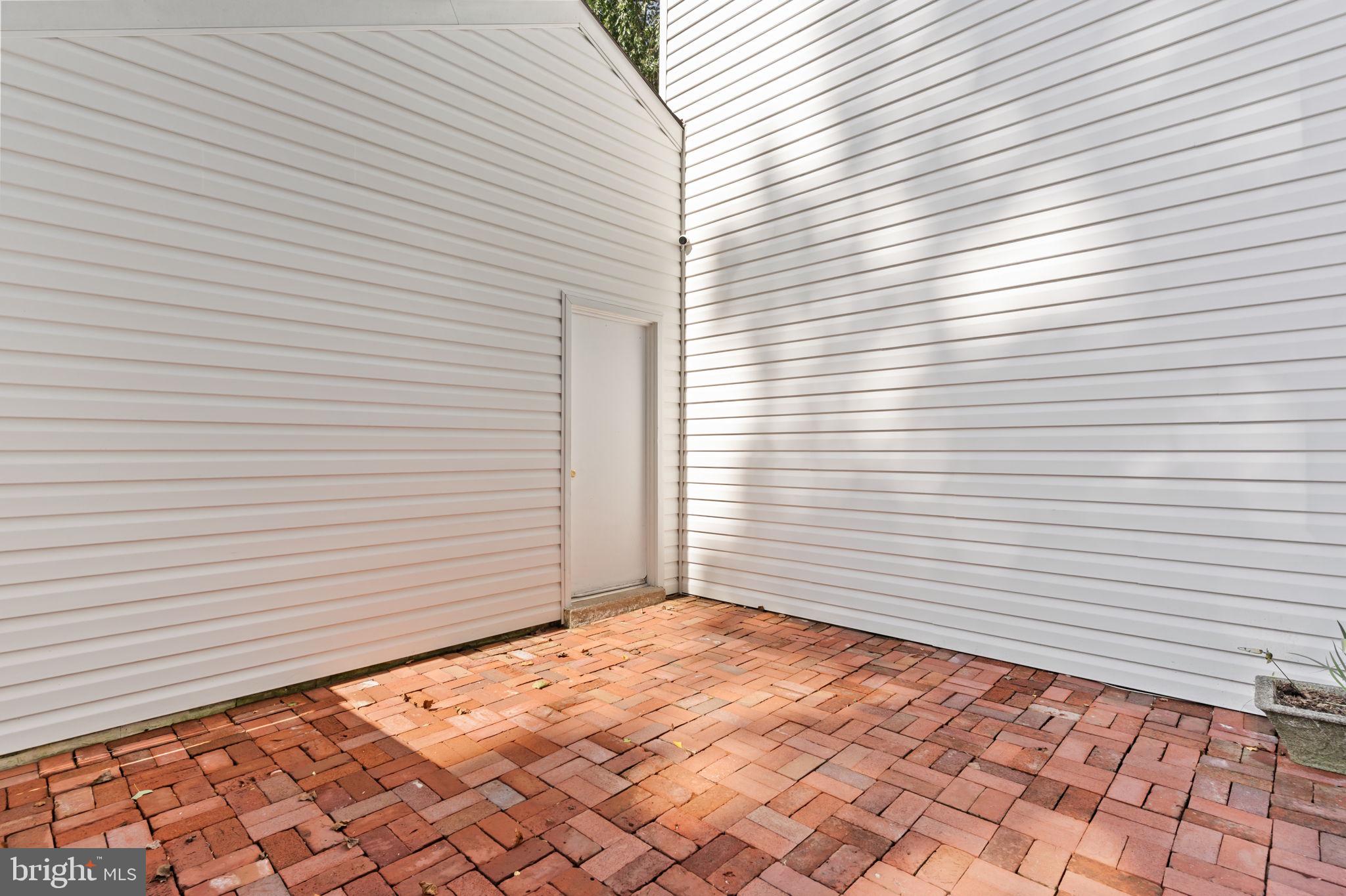 812 Green Ridge Circle Langhorne, PA 19053 - Photo 36 of 36 Private Court Yard between Garage and Family Rm.