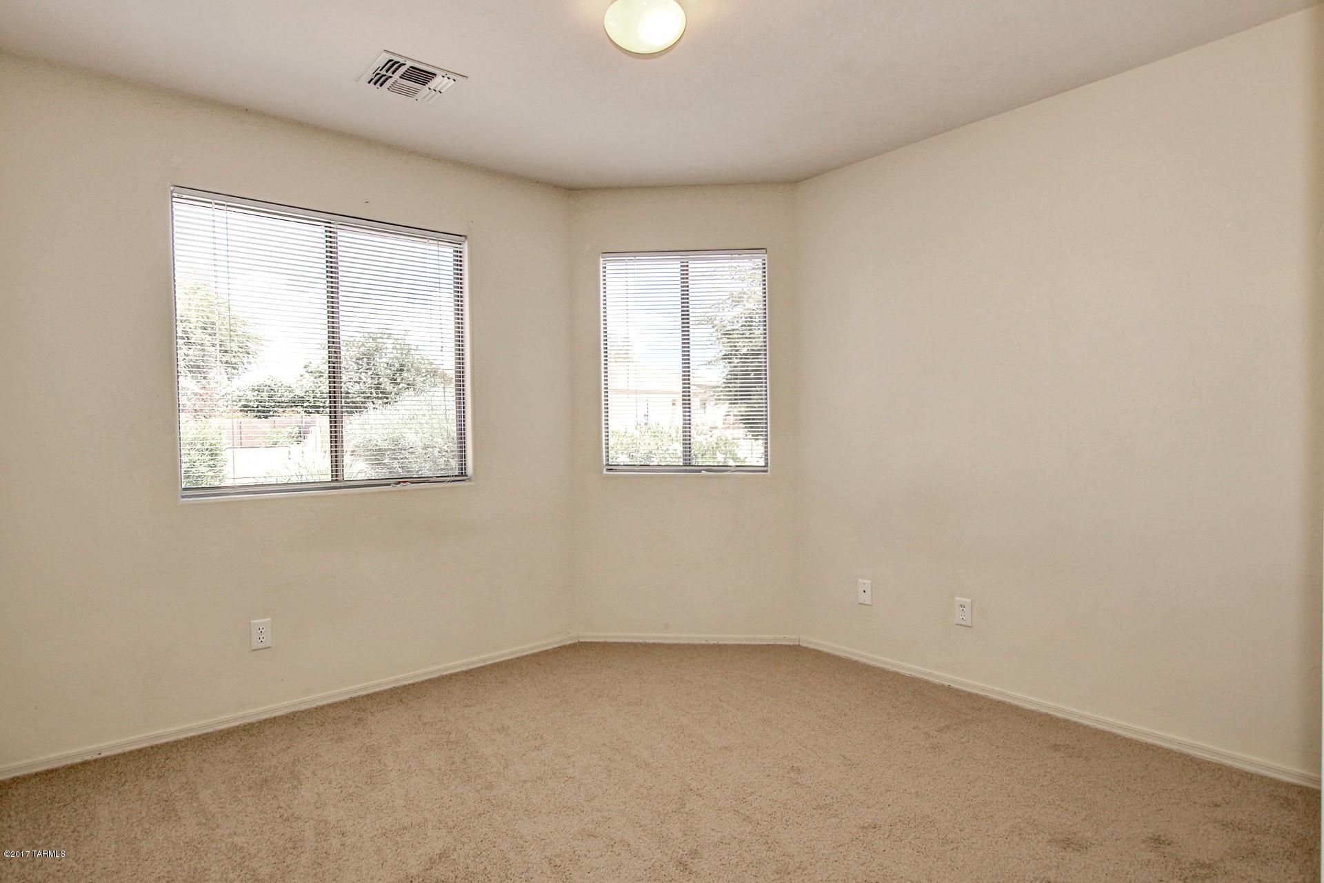 8350 East Bowline Road Tucson, AZ 85710 - Photo 18 of 26 an empty room with a window