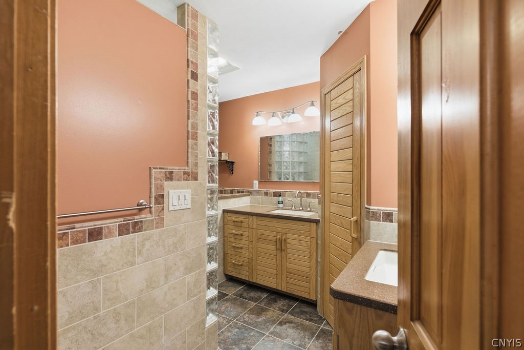 1000 Rail Fence Road Camillus, NY 13031 - Photo 25 of 37 His-and-hers split vanities add both practicality