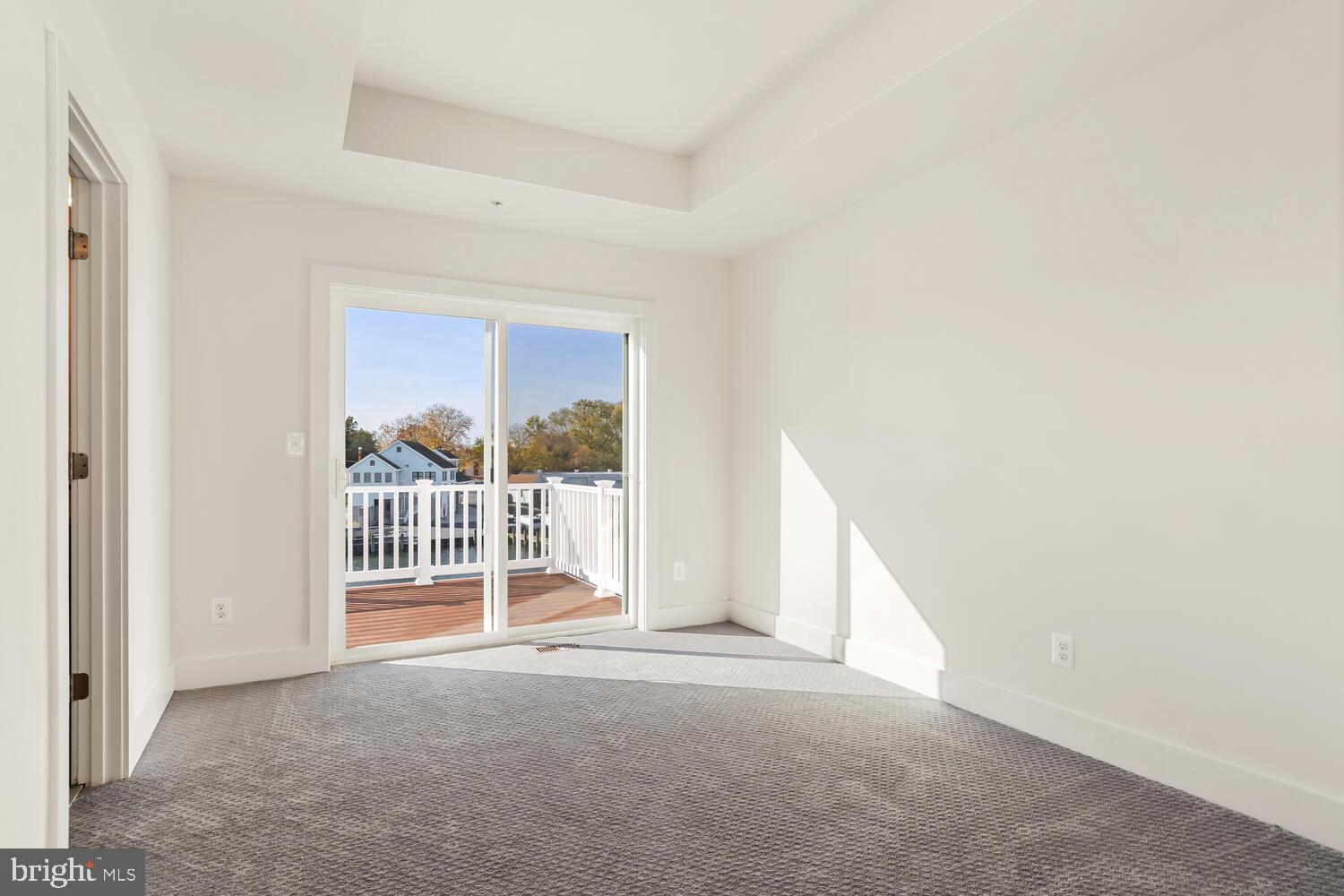 34 Riverside Drive Cambridge, MD 21613 - Photo 22 of 64 Primary suite with private deck access