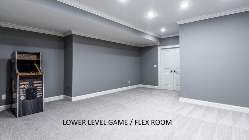 4459 Green Cook Road Johnstown, OH 43031 - Photo 82 of 103 LOWER LEVEL GAME / FLEX / ARTS AND CRAFTS ROOM WITH ACCESS TO UTILITY ROOM