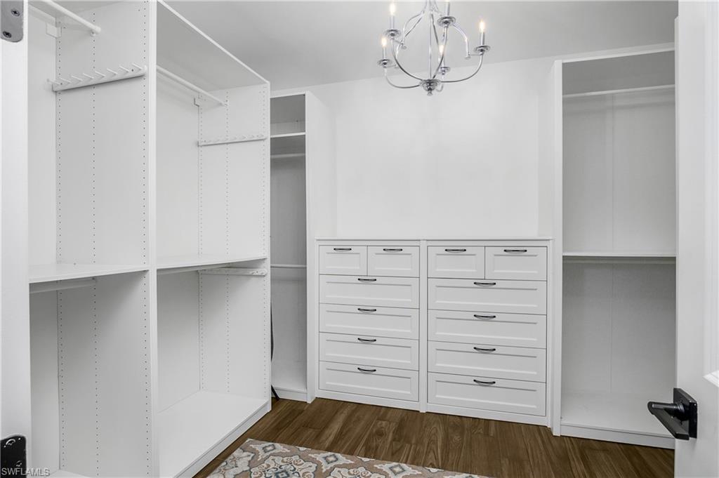 17570 Ashcomb Way Estero, FL 33928 - Photo 24 of 50 a view of walk in closet with empty racks