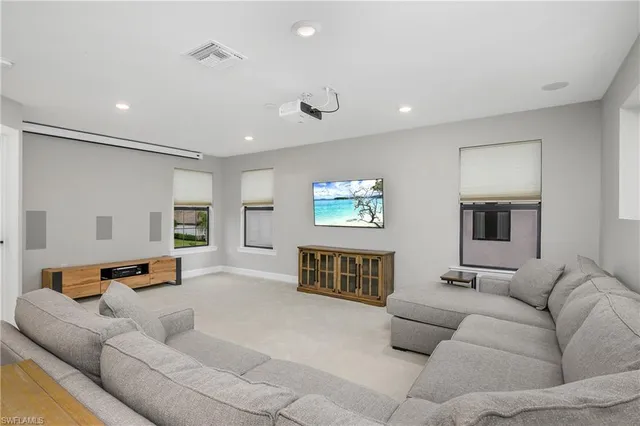 a living room with furniture and a couch