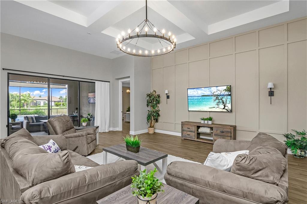 17570 Ashcomb Way Estero, FL 33928 - Photo 3 of 50 a living room with furniture potted plant and a large window