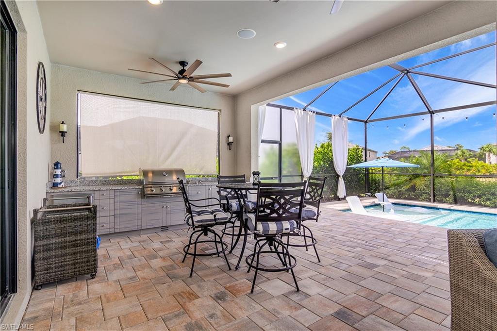 17570 Ashcomb Way Estero, FL 33928 - Photo 38 of 50 an outdoor space with furniture and garden view