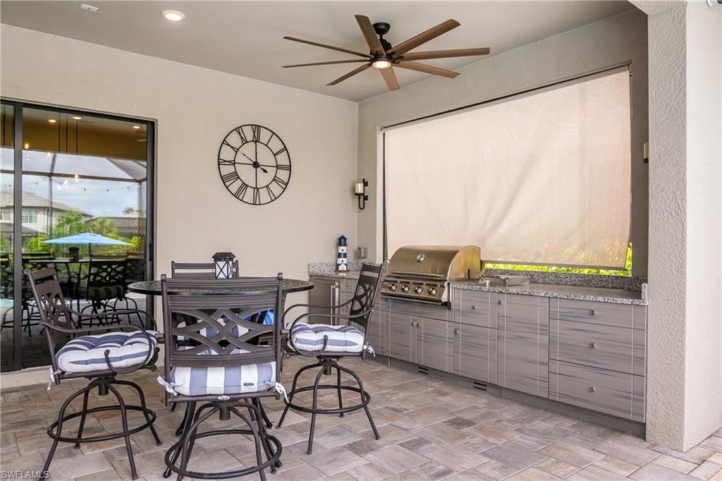 17570 Ashcomb Way Estero, FL 33928 - Photo 40 of 50 a view of a dining room with furniture window and outside view