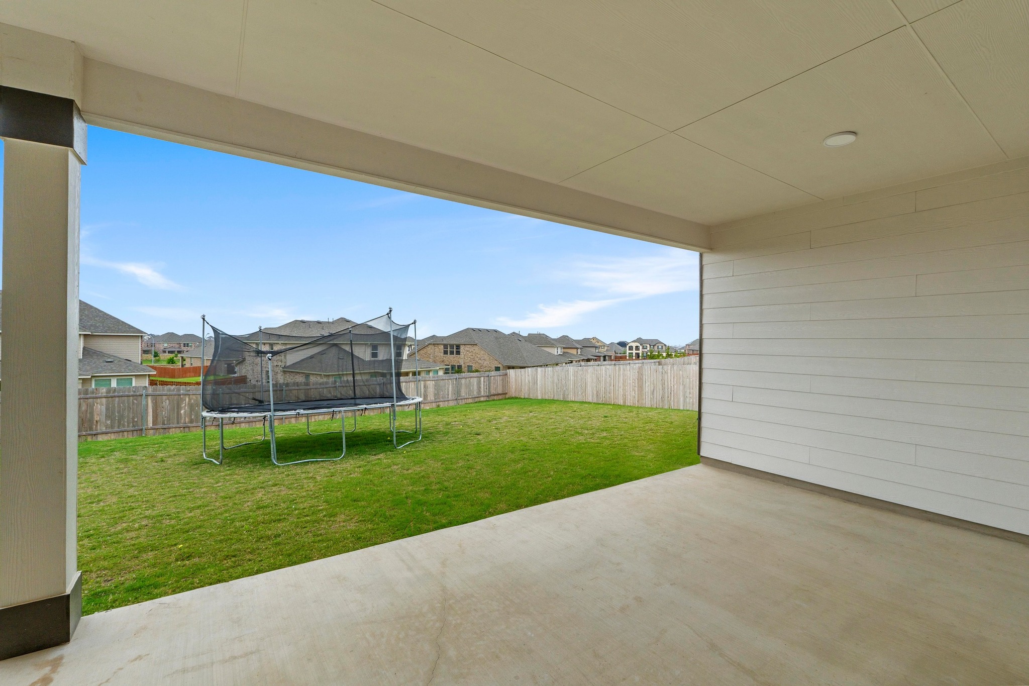 4729 San Rufo Drive Round Rock, TX 78665 - Photo 32 of 36 Covered patio with a concrete slab, recessed lighting, and a slatted wall