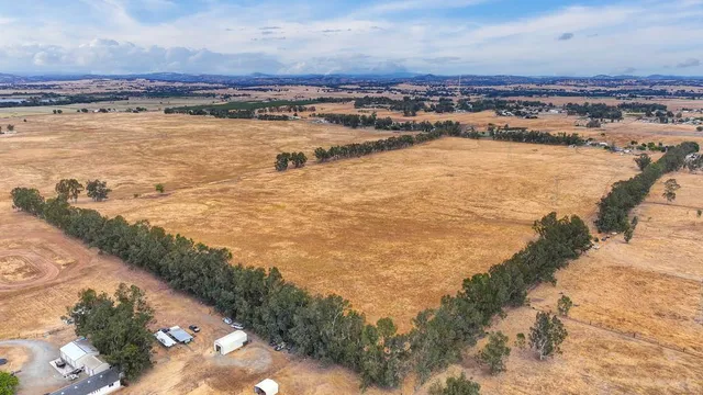 a view of an ocean and city