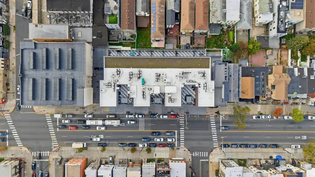 an aerial view of a city with lots of residential buildings