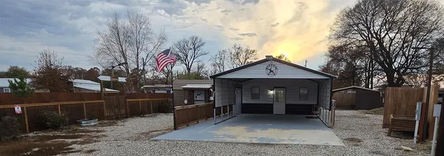 a view of a chairs and tables in the patio