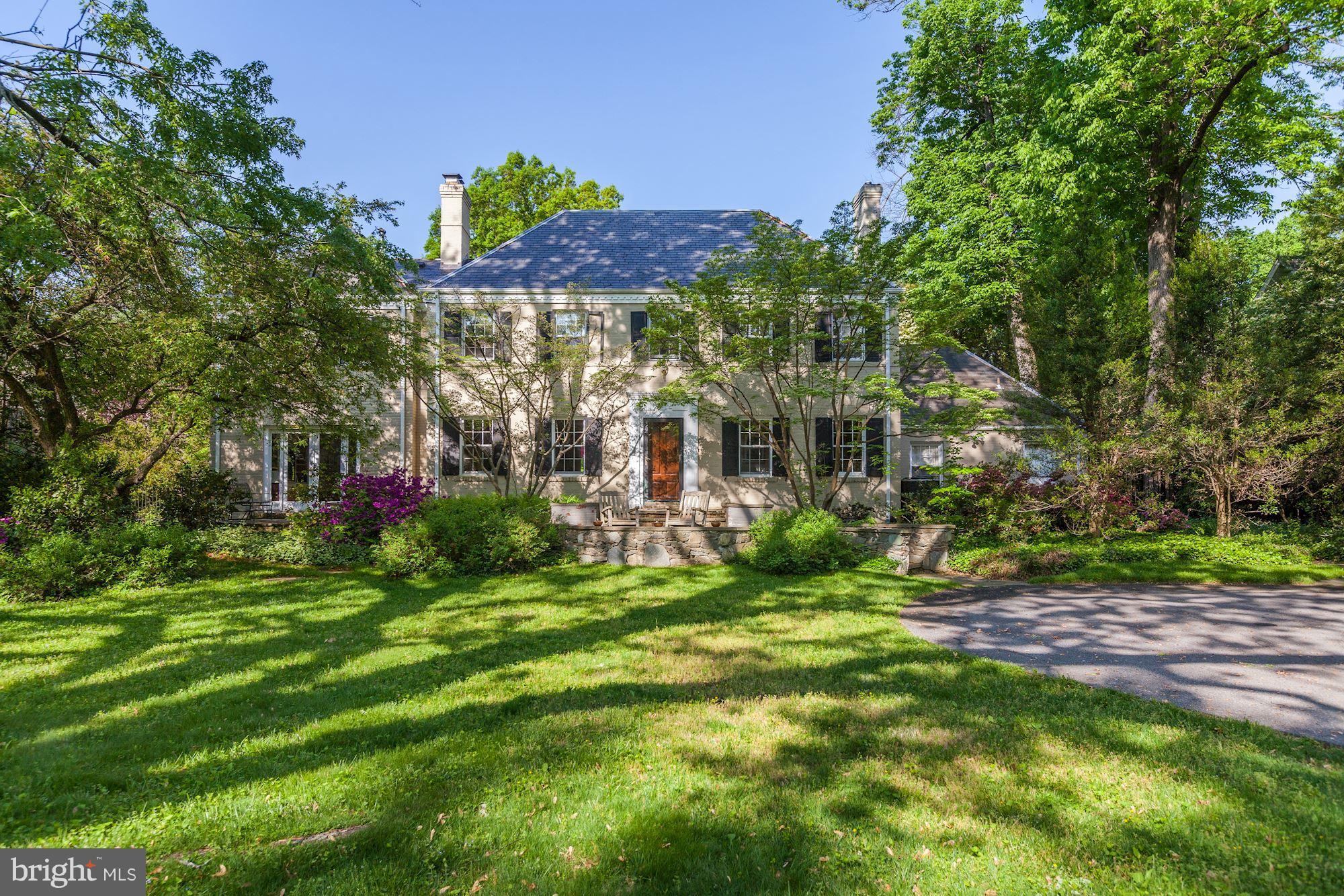 6800 Glenbrook Road Bethesda, MD 20814 - Photo 2 of 30 a view of a big yard in front of a house
