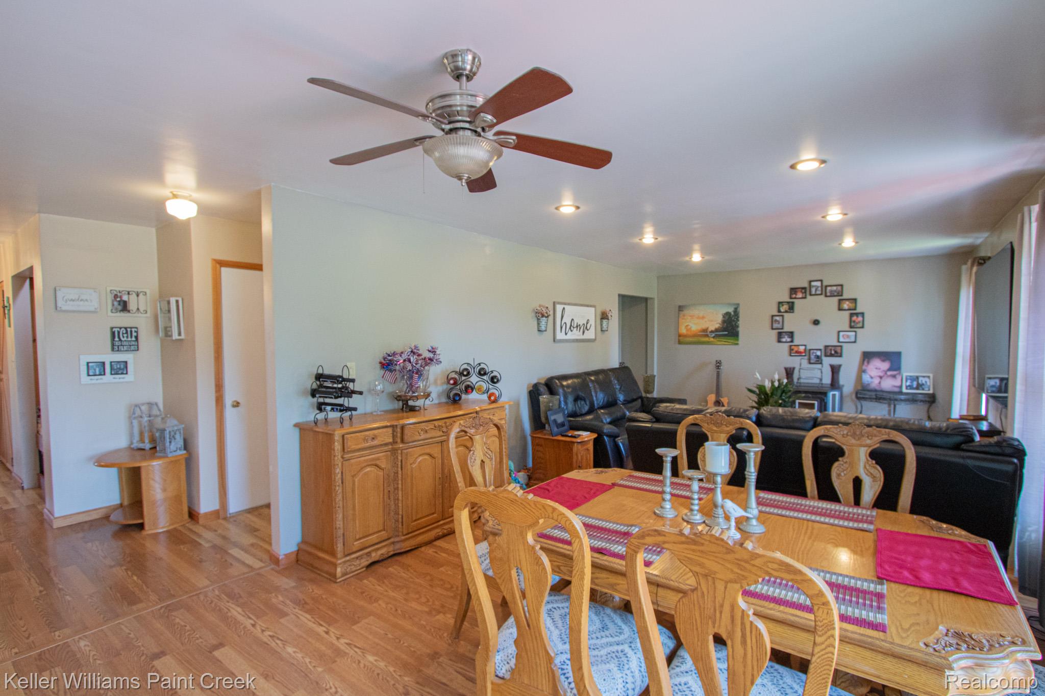 625 Howell Road Allenton, MI 48002 - Photo 8 of 46 Wood-finish flooring throughout, recessed lighting, and a ceiling fan with integrated lighting