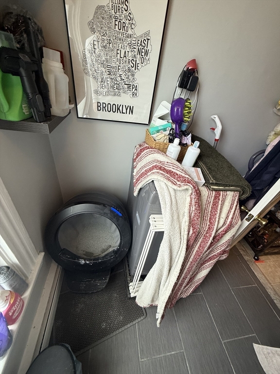 60 Walden Street, Unit 3 Cambridge, MA 02140 - Photo 9 of 12 a utility room with dryer and washer