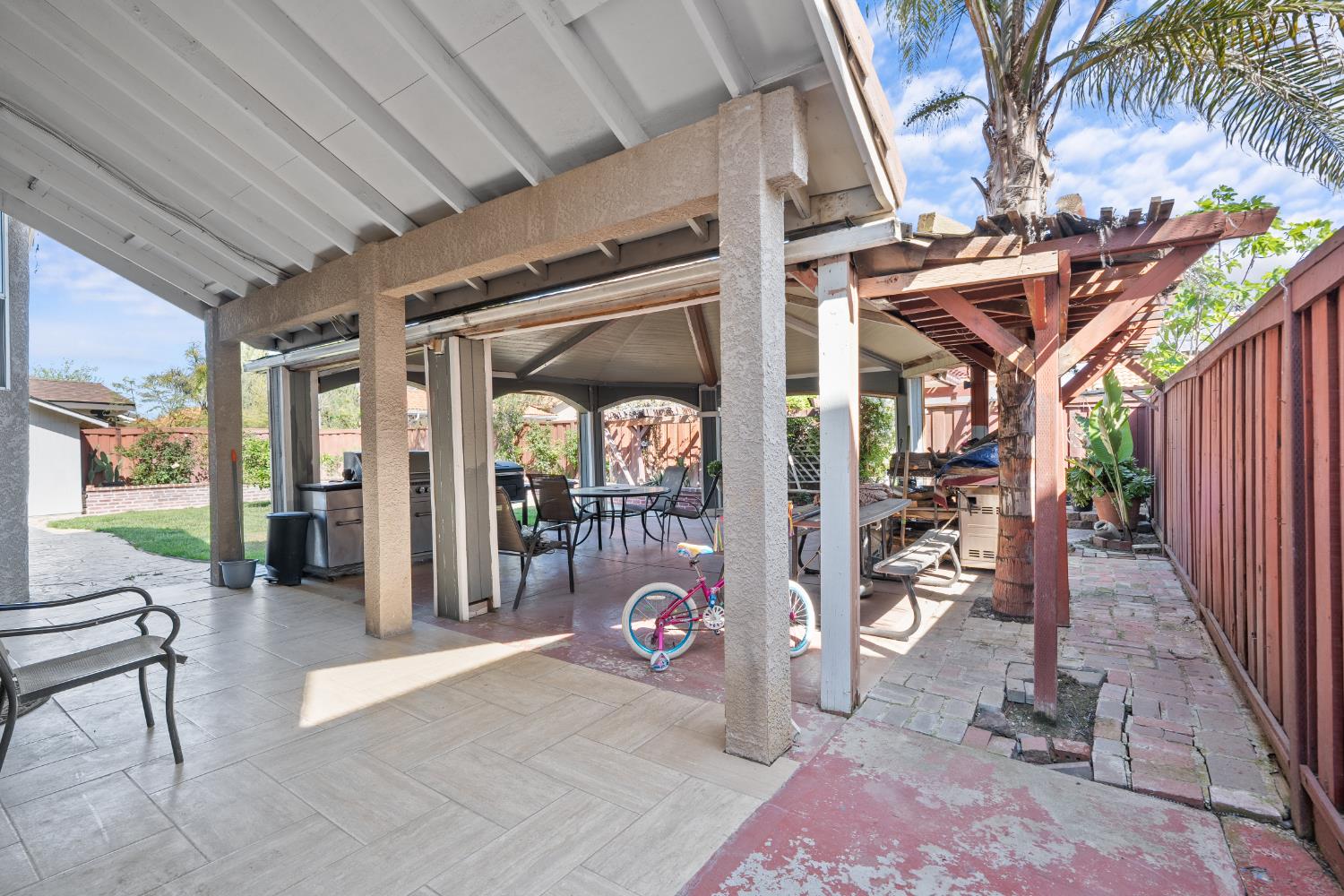 446 Port Street Los Banos, CA 93635 - Photo 44 of 55 An Oversized Gazebo & Patio makes for an Abundance of Shade and Creates a Perfect Space for Gatherings.