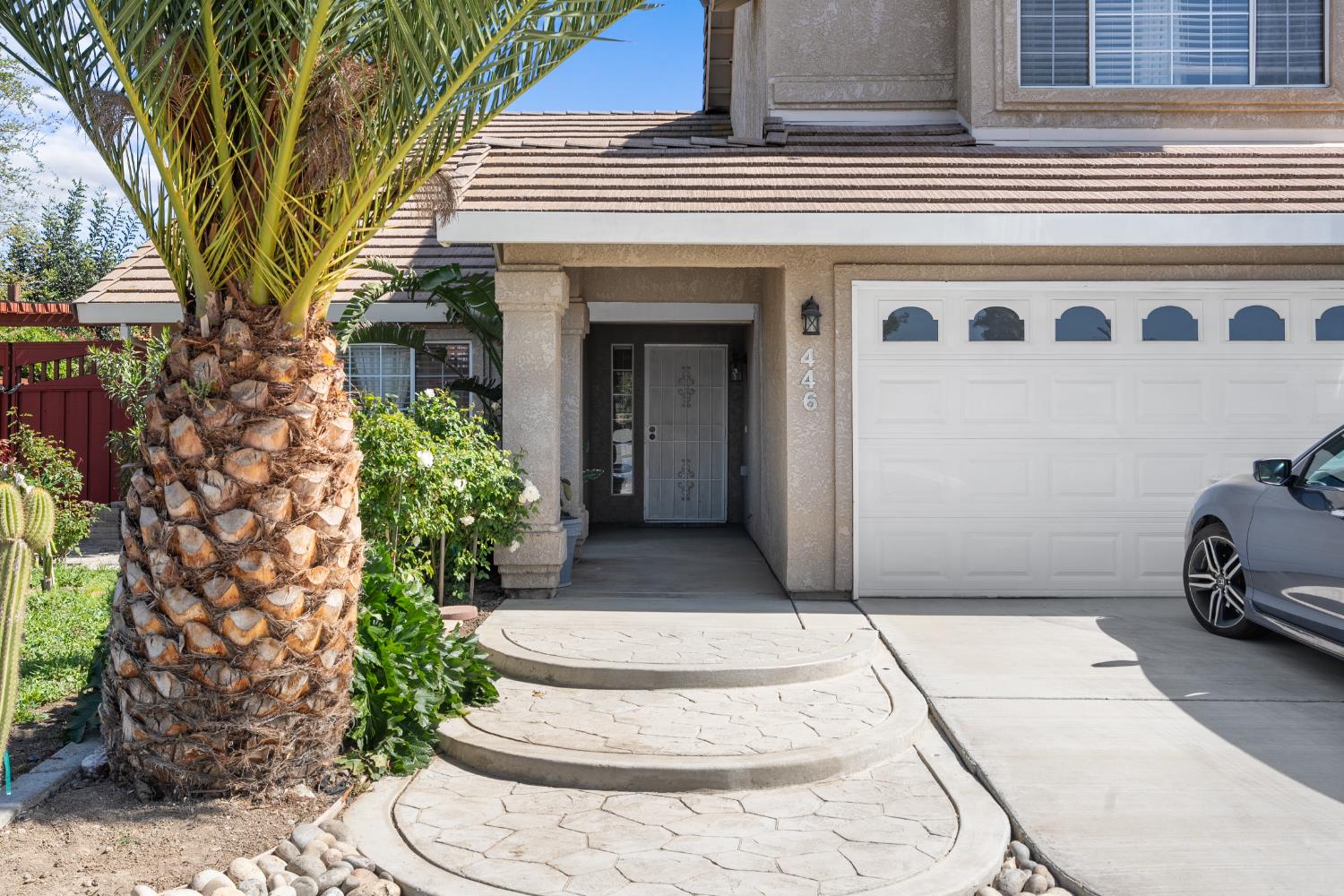 446 Port Street Los Banos, CA 93635 - Photo 5 of 55 Beautiful Custom Concrete Steps Create a Welcoming Entrance to the Front Door.