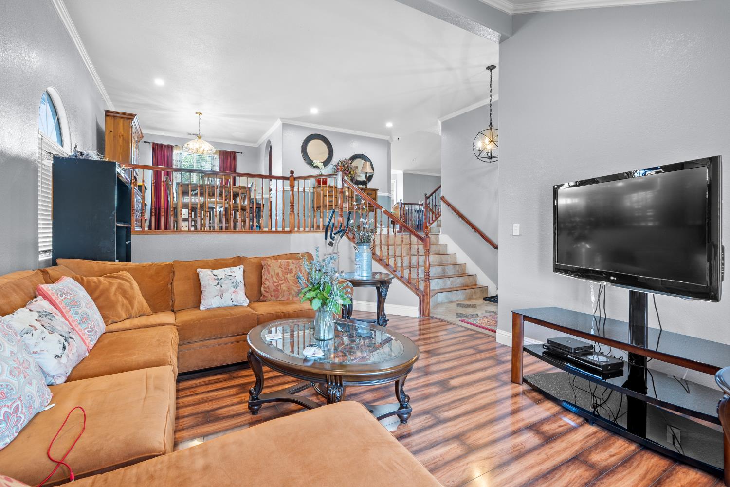 446 Port Street Los Banos, CA 93635 - Photo 7 of 55 The Formal Living Room is Located Upon Entry, Offering an Inviting Space With an Elevated Position in this Tri-Level Layout.