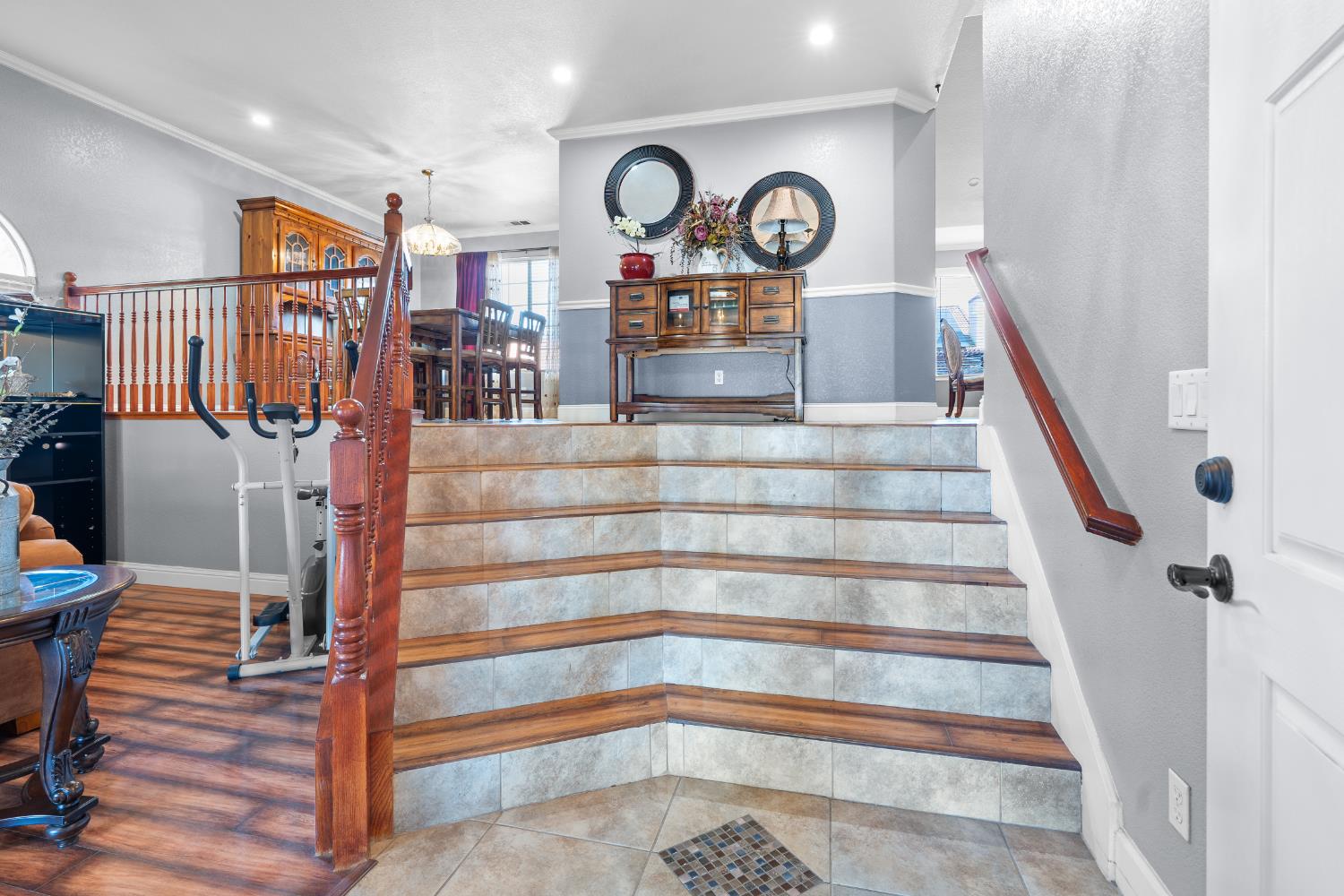446 Port Street Los Banos, CA 93635 - Photo 9 of 55 Beautiful Tile Flooring in the Foyer leading up to a Landing Overlooking the Living Room.