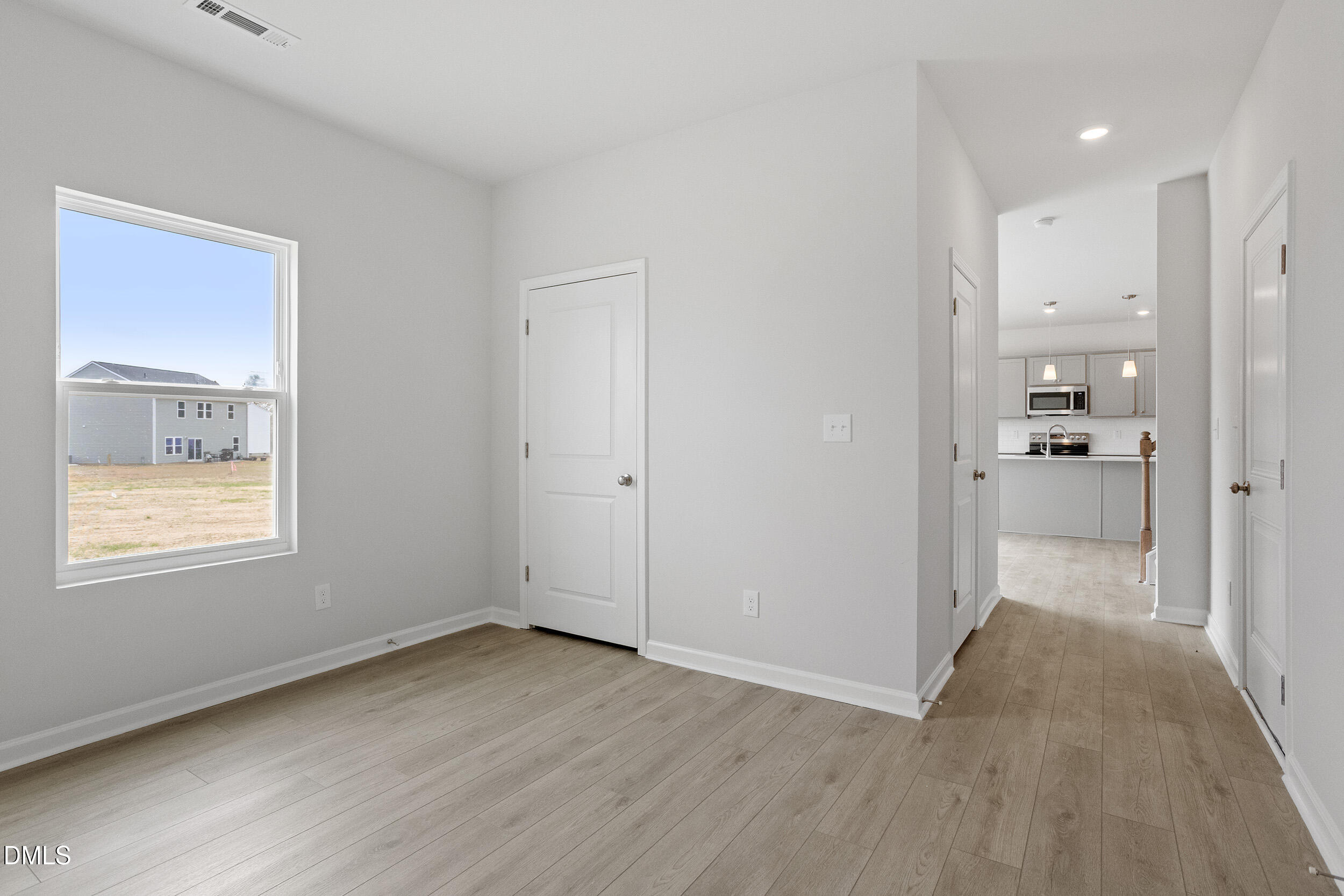 79 Osgood Street Angier, NC 27501 - Photo 18 of 31 a view of an empty room and window
