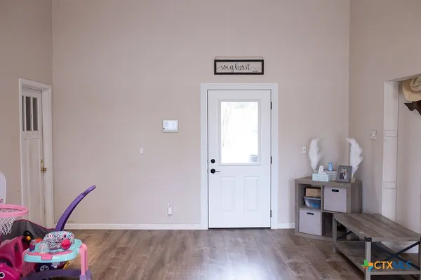 a view of front door with hallway