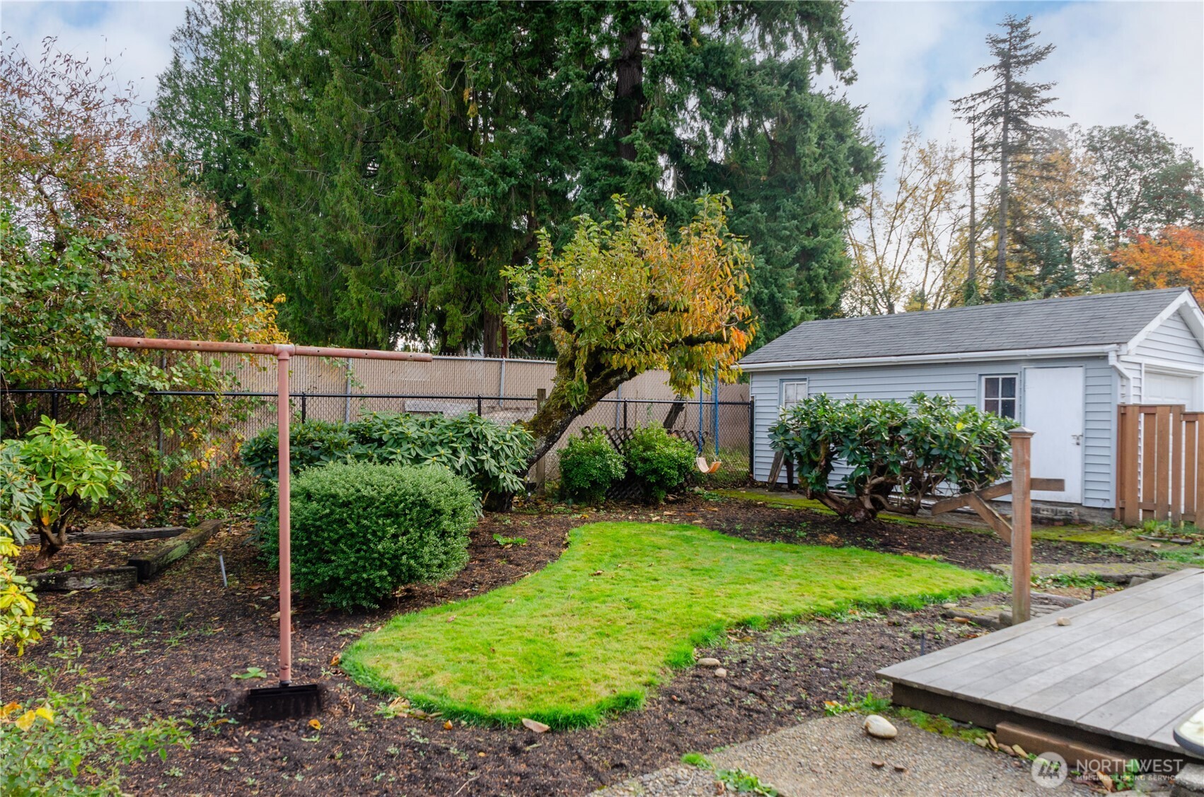 2723 Locust Avenue West University Place, WA 98466 - Photo 13 of 15 a view of a house with a yard