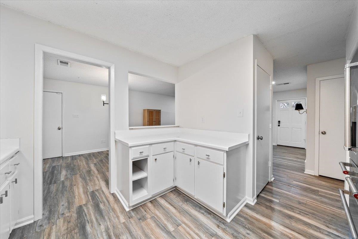 947 Hunters Retreat Drive Collierville, TN 38017 - Photo 11 of 27 a kitchen with stainless steel appliances cabinets and a center island