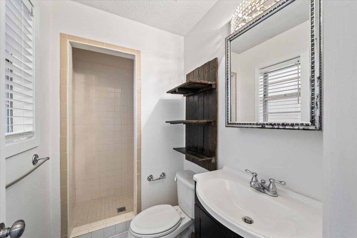 947 Hunters Retreat Drive Collierville, TN 38017 - Photo 15 of 27 Full Primary bathroom featuring Roomy Shower, vanity, and extra shelving.