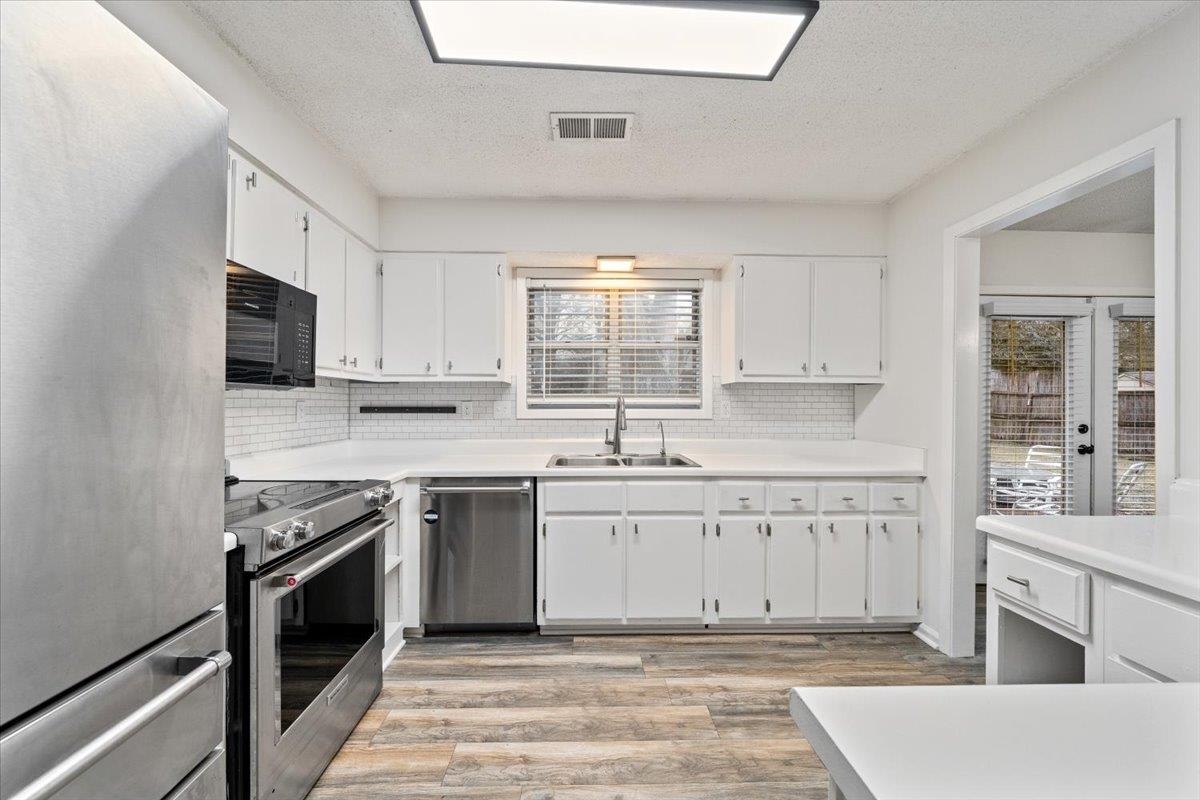 947 Hunters Retreat Drive Collierville, TN 38017 - Photo 10 of 27 Kitchen featuring appliances with stainless steel finishes Refrigerator remains.