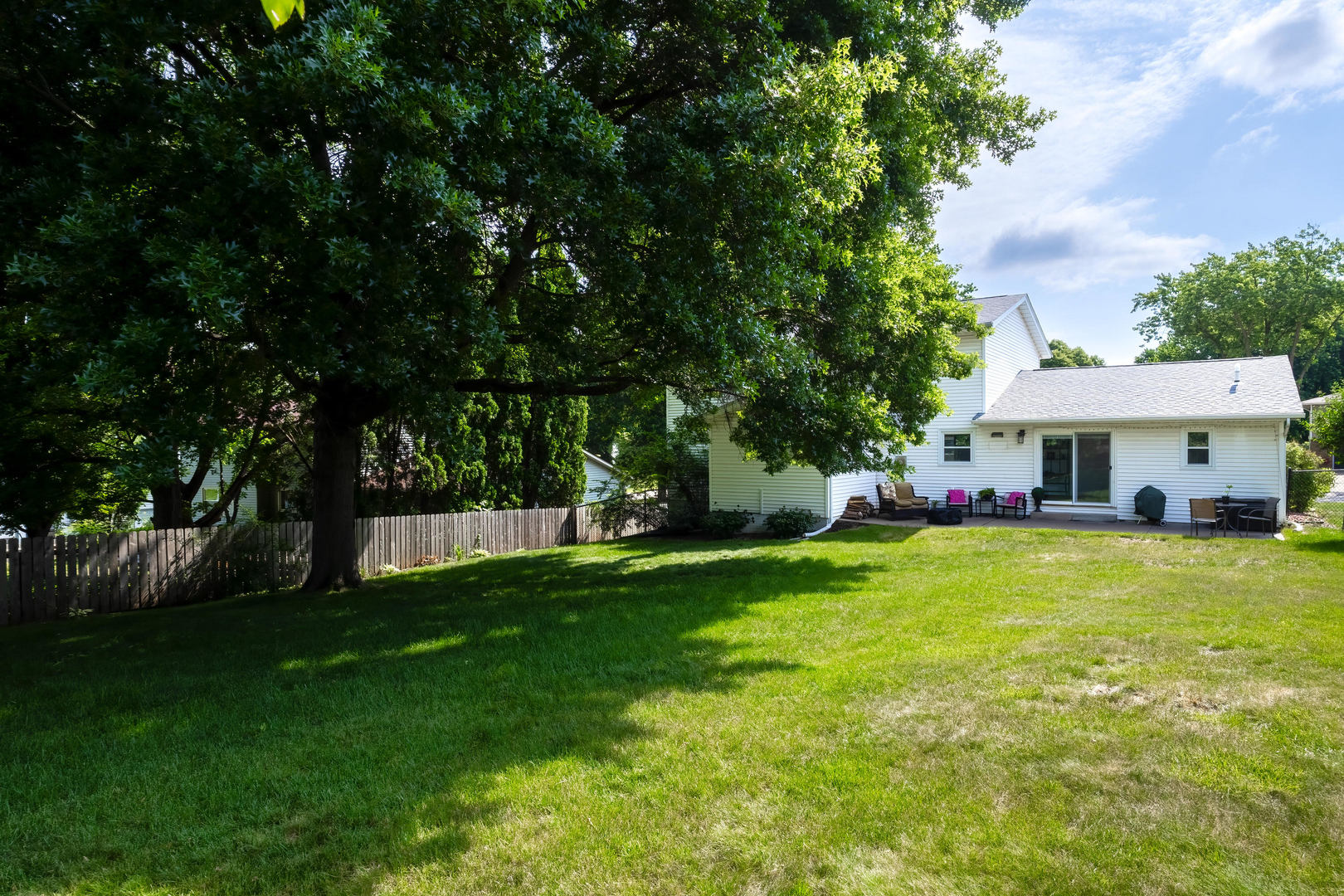 4314 Spring Street Davenport, IA 52807 - Photo 49 of 51 a front view of a house with garden