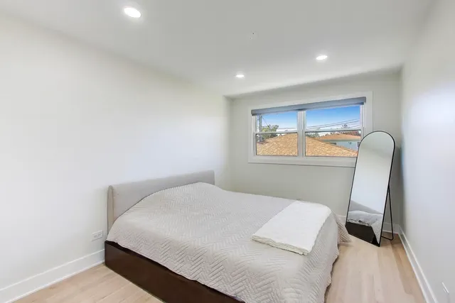 a workspace with furniture and a window