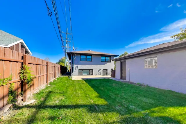 a view of a backyard with a garden