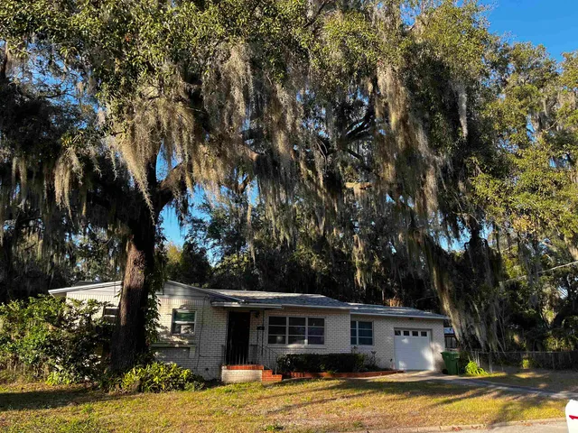 a view of a house with swimming pool