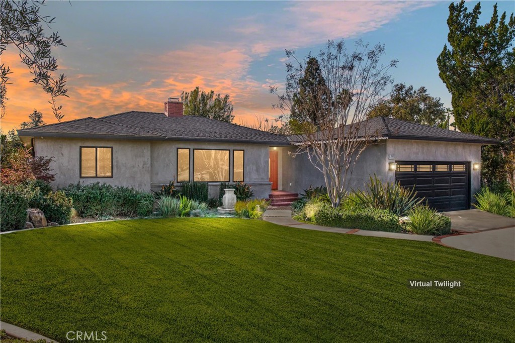 1374 Prospect Drive Redlands, CA 92373 - Photo 1 of 1 a front view of a house with a yard and potted plants