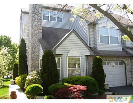375 Draco Road Piscataway, NJ 08854 - Photo 1 of 25 a view of a brick house next to a yard
