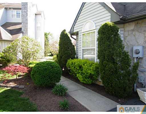 375 Draco Road Piscataway, NJ 08854 - Photo 2 of 25 a front view of a house with a yard