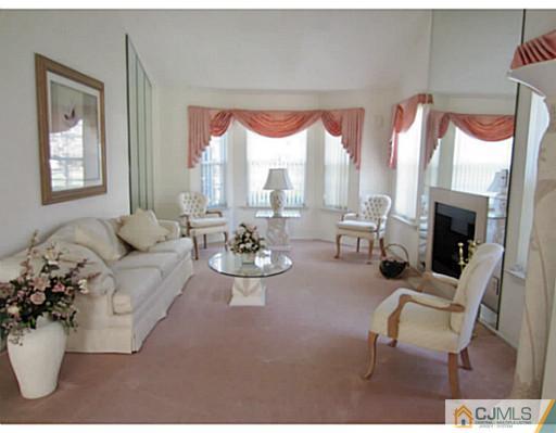375 Draco Road Piscataway, NJ 08854 - Photo 6 of 25 a living room with furniture and a large window