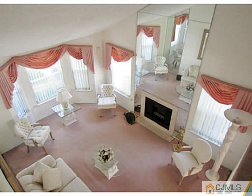 375 Draco Road Piscataway, NJ 08854 - Photo 8 of 25 a living room with furniture and a fireplace