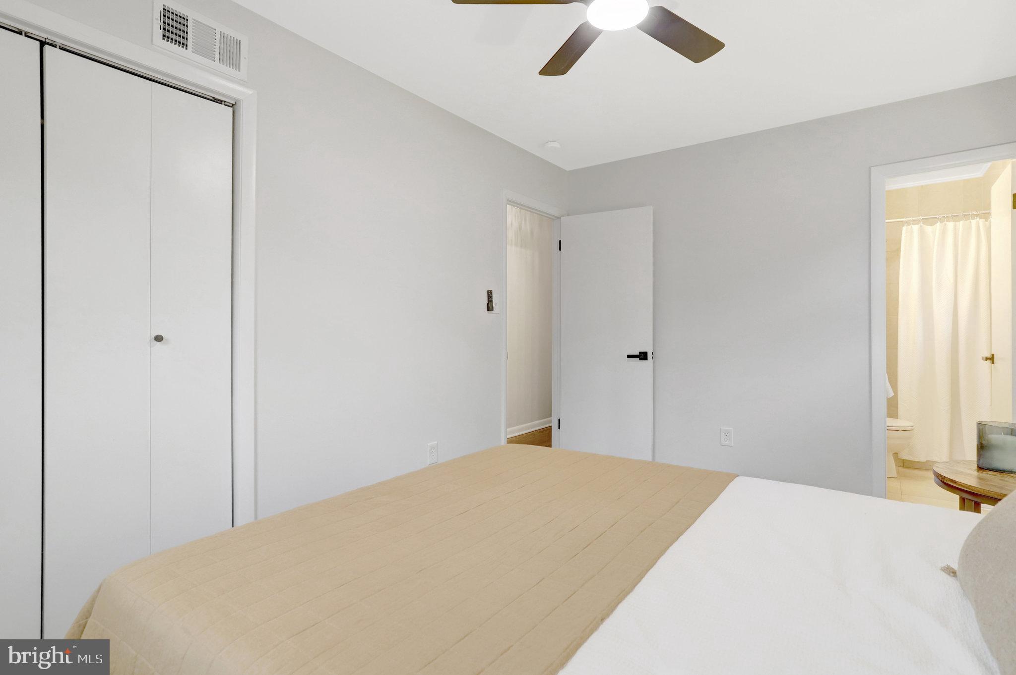 4206 16th Road South Arlington, VA 22204 - Photo 14 of 35 a bedroom with a bed and a window