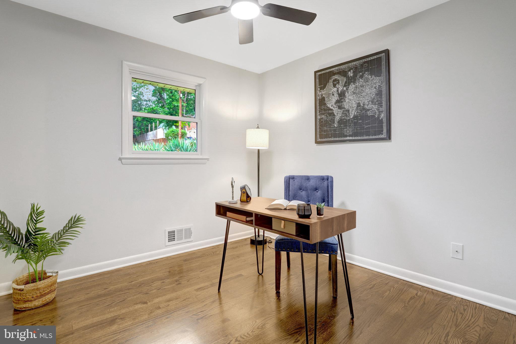 4206 16th Road South Arlington, VA 22204 - Photo 18 of 35 a view of a workspace with furniture and a window