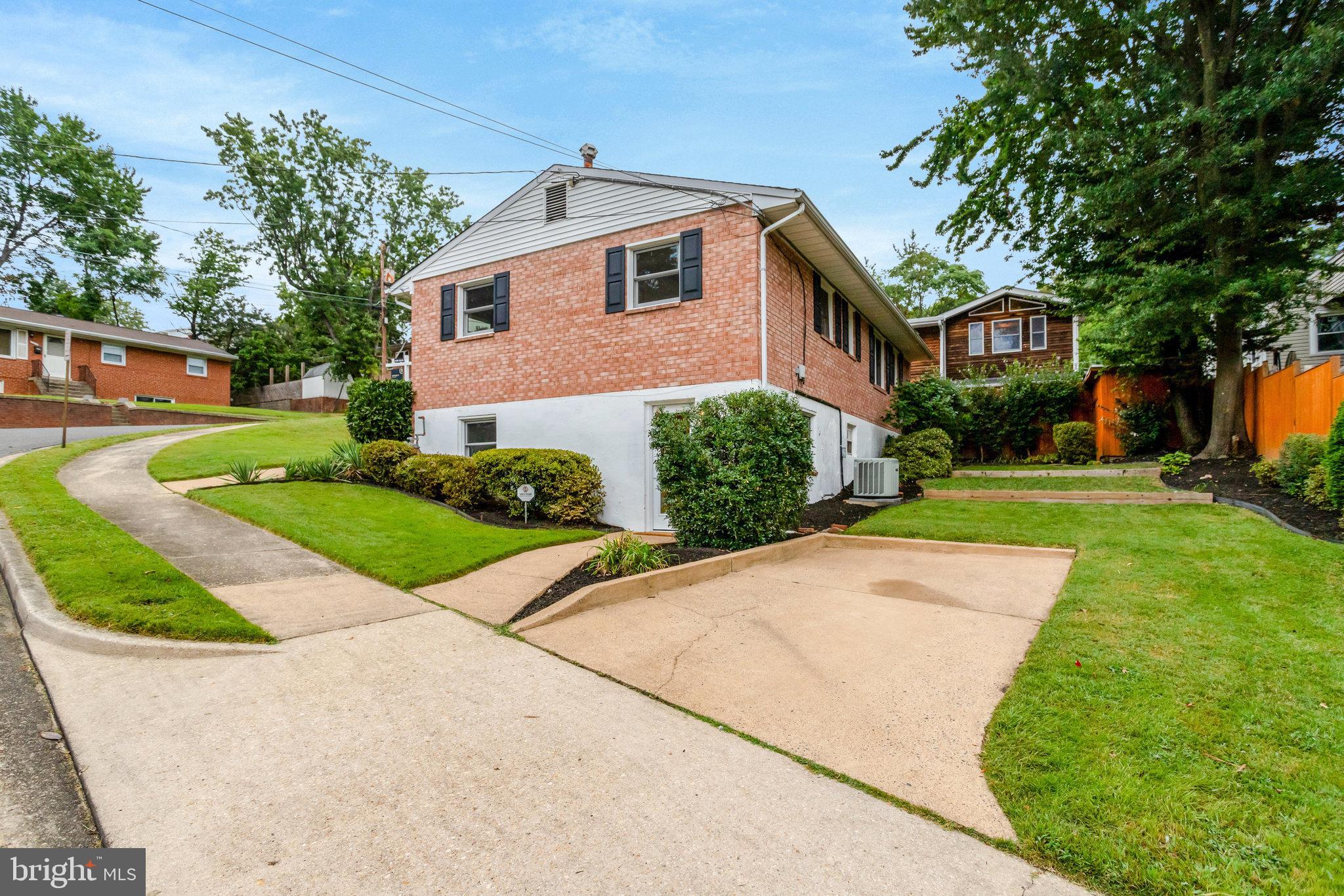 4206 16th Road South Arlington, VA 22204 - Photo 29 of 35 a front view of a house with a yard