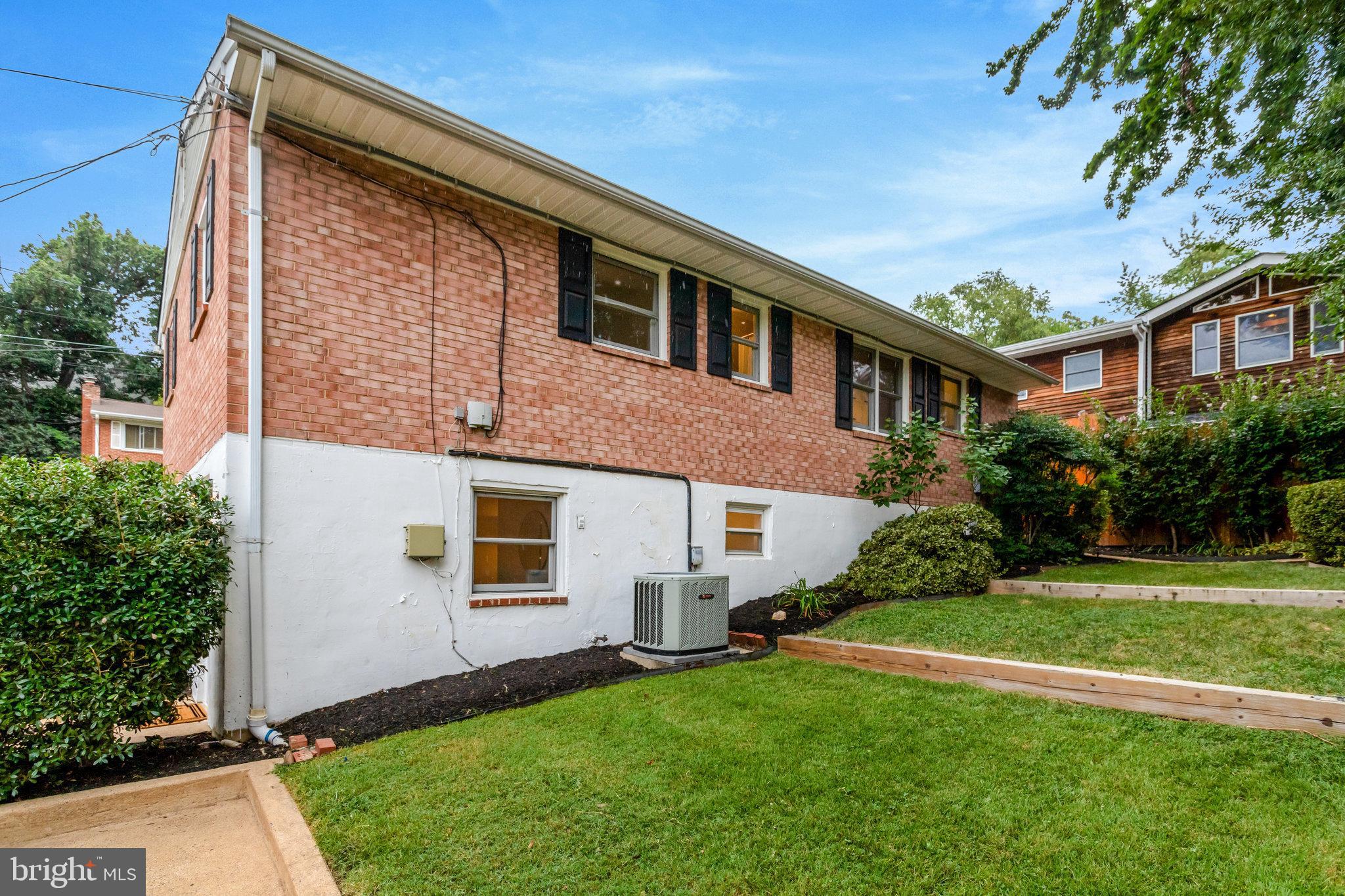 4206 16th Road South Arlington, VA 22204 - Photo 30 of 35 a front view of a house with a yard