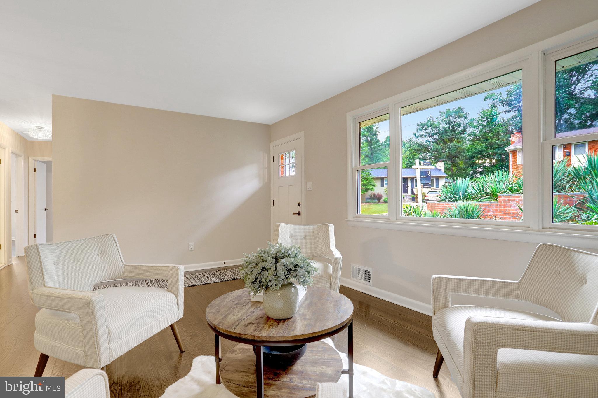 4206 16th Road South Arlington, VA 22204 - Photo 6 of 35 a living room with furniture and a potted plant