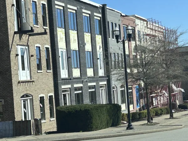 a front view of a building with street view